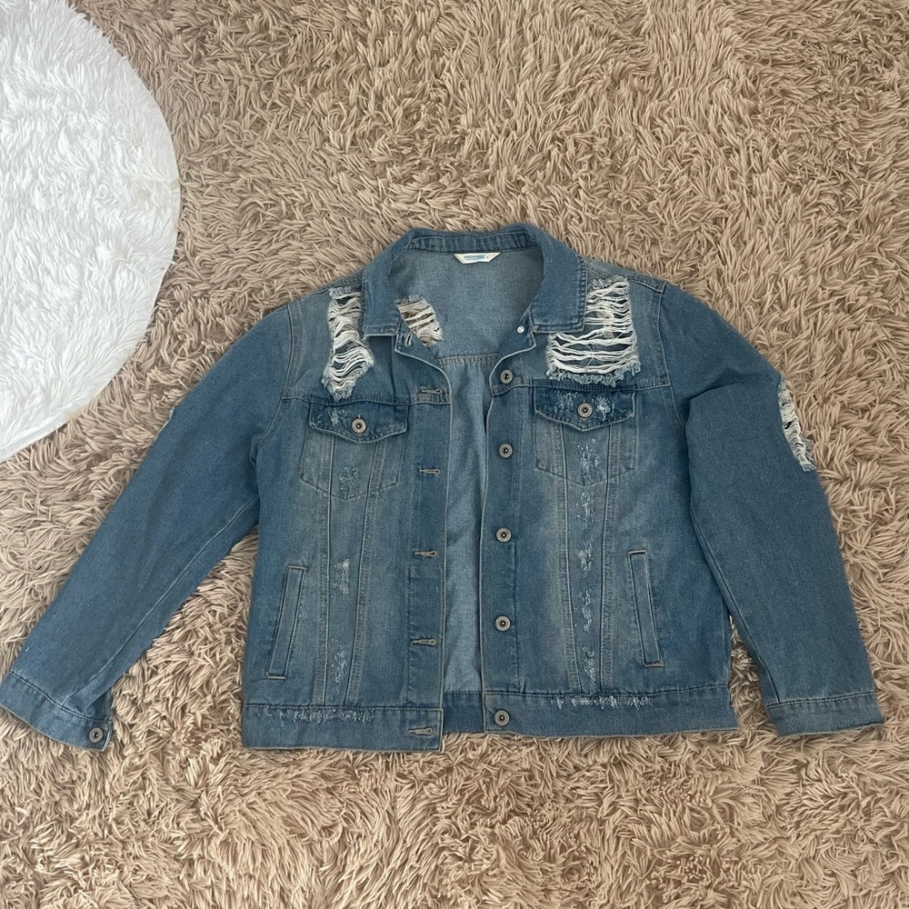 Distressed jeans jacket size large